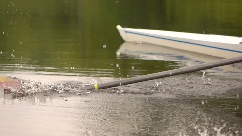 Competitions in rowing. Paddle in the water. Water splashes. Slow motion. Video stock 77145910