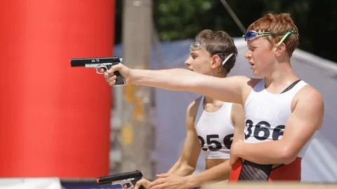 Competitions with shooting from a pneumatic pistol Stock Footage 71818094