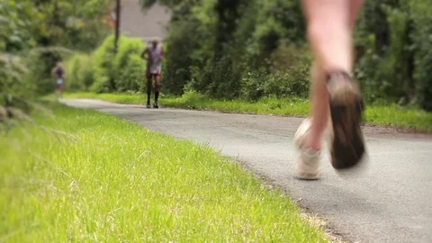 Competitive runners running a long distance marathon race in the rural countrysi Video stock 72133002
