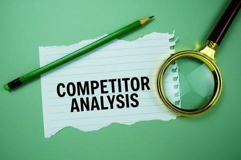 Competitor Analysis quotes text on paper torn with magnifying glass top vie.. Stock Photos