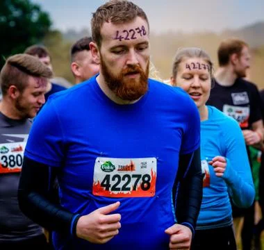 A competitor taking part in a Tough Mudder extreme sport event at Drumlanrig  Stock Photos