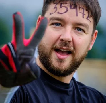 A competitor taking part in a Tough Mudder extreme sport event at Drumlanrig Stock Photos