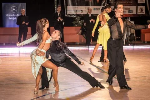 Competitors dancing latin dance on the conquest Stock Photos