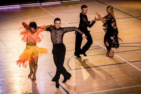 Competitors dancing latin dance on the conquest Stock Photos