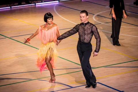Competitors dancing latin dance on the conquest Stock Photos