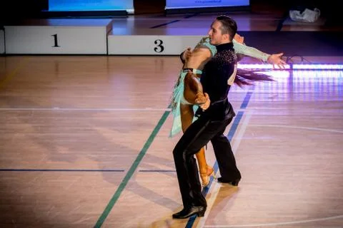 Competitors dancing latin dance on the conquest Stock Photos