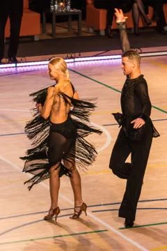 Competitors dancing latin dance on the conquest Stock Photos