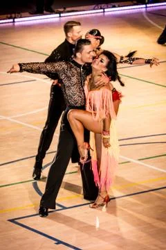 Competitors dancing latin dance on the conquest Stock Photos