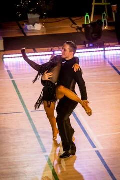 Competitors dancing latin dance on the conquest Stock Photos