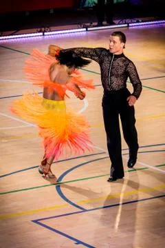 Competitors dancing latin dance on the conquest Stock Photos