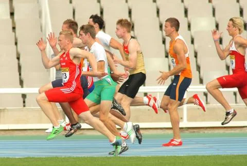 Competitors on start of 100m Stock Photos