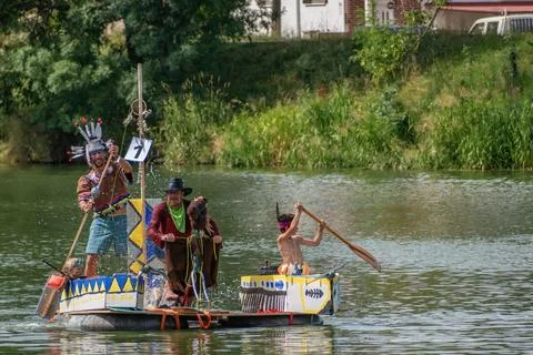 Competitors, theme of the Wild West, arrive at the finish line 写真素材