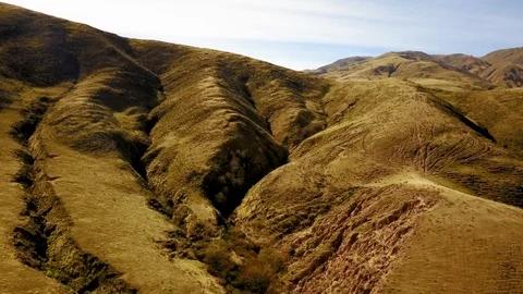 Compilation of Canyon, Hill, Crack and clay house in mountain landscape, Aerial Stock Footage 89865620