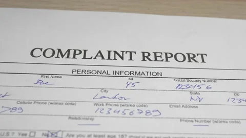 Complain Report Document Form Panning Closeup Stock Footage 152853951