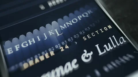 Complete alphabet sequence from A to Z, person selects letter L Stock Footage 334944361