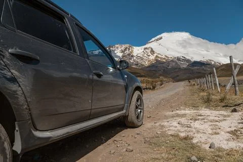 A complete black car seen from the side outside in a sunny place Foto stock