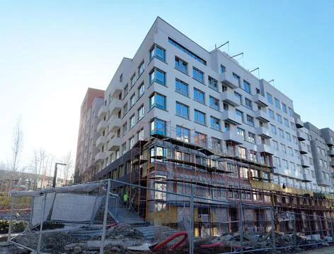 To complete the construction of a new multi-storey building. Stock Photos