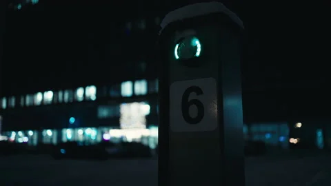 Complete darkness: Charging station for electric EV vehicles in the snow with Stock Footage 225774142