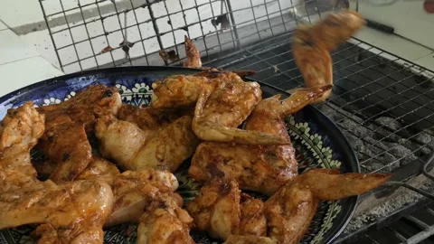 Complete dish with cooked barbecue wings Stock Footage 159302104