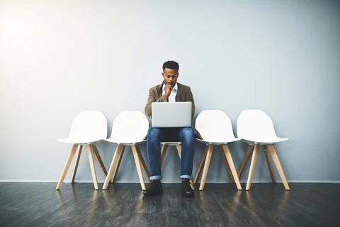 Complete focus before the final interview. Studio shot of a young businessman Stock Photos