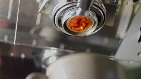 A complete process of beautifully extracting espresso in a thin stream from the Stock Footage 173050327