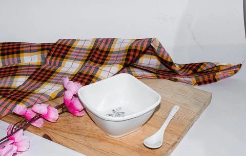 Complete setup for empty food bowl or white bowl and spoon Stock Photos