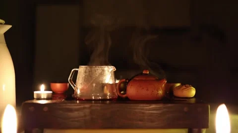 A complete tea ceremony set featuring a chabana, small bowls, a fairness pitcher Stock Footage 299384189
