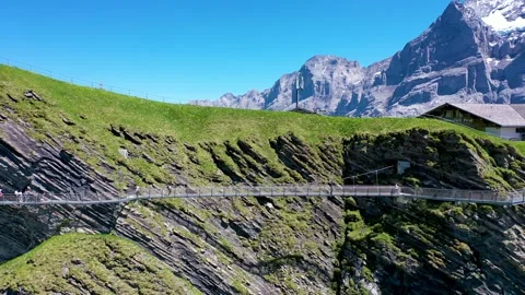 Complete view of first cliff walk bridge in Grindelwald first in Switzerland Stock Footage 246983774
