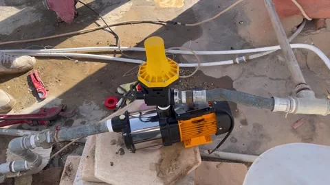 Complete Water Booster Pump Installation on Rooftop 動画素材 345611793