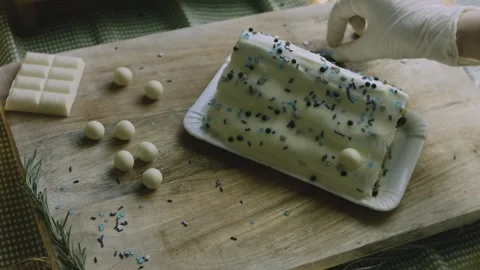 Complete white cake decorated with chocolate spheres Stock Footage 342129488