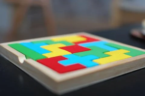 Completed colourful puzzle using spatial awareness and critical thinking Stock Photos