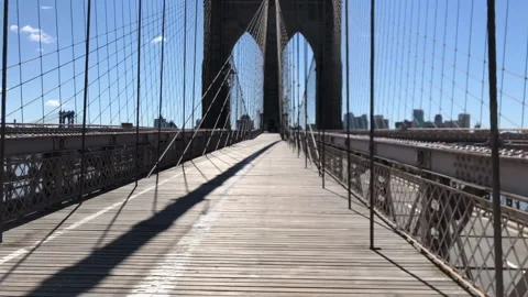 Completely deserted iconic Brooklyn Bridge during NYC COVID shutdown Stock Footage 140991762