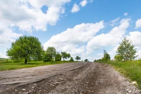 Completely destroyed road, difficult traffic area, threat of damage to vehicl Stock Photos
