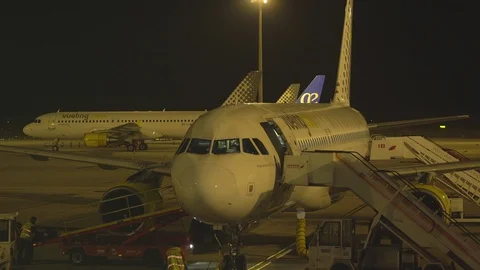 Completely white passenger plane before flight. Aircrafts in airport Stock Footage 98035497