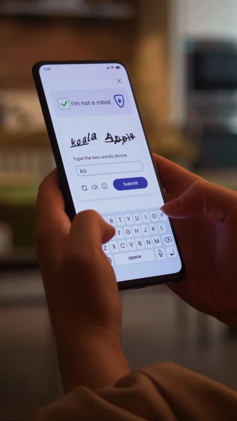 Completing CAPTCHA verification on a smartphone. Proving not to be a bot Stock Footage 276822653
