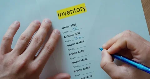 Completing an Inventory Checklist by Hand Stock Footage 337760189