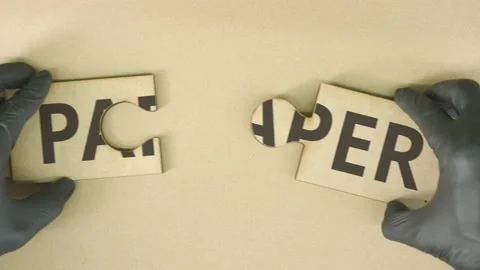 Completing jigsaw puzzle with PAPER text Stock Footage 141498091