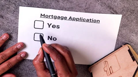 Completing a mortgage application with options to select Stock Footage 302212724
