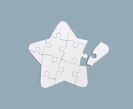 Completing star-shaped puzzle with lacking missing piece Stock Photos