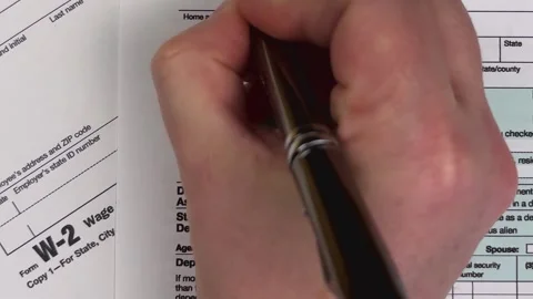 Completing tax form Stock Footage 304645769