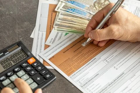 Completing the tax return called PIT. Annual tax settlement in Poland. Stock Photos
