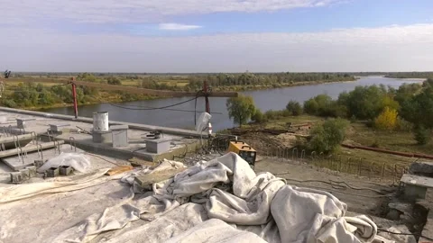 The completion of the bridge across the river Stock Footage 105629599