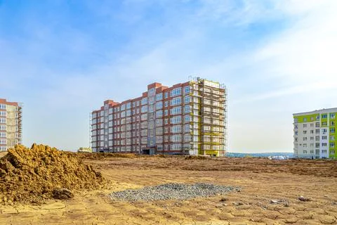 Completion of construction of an apartment building, insulation and final Stock Photos
