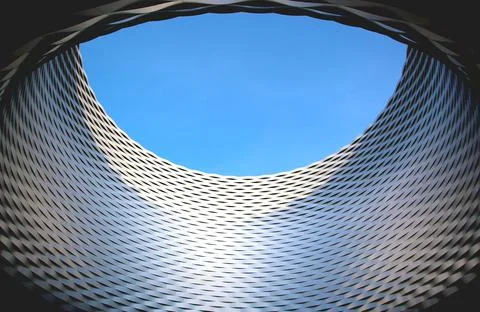 Complex architecture, reflective, undulating organic forms. Foto stock