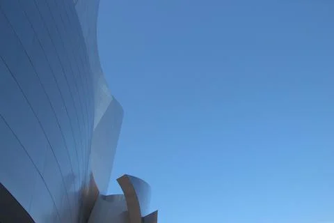 Complex architecture, reflective, undulating organic forms. Stock Photos