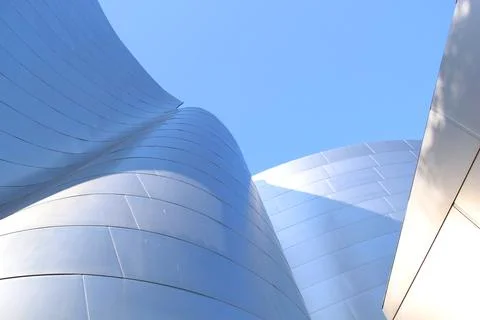 Complex architecture, reflective, undulating organic forms. Stock Photos