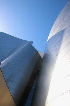 Complex architecture, reflective, undulating organic forms. Stock Photos