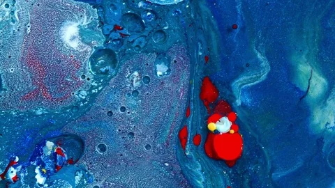 Complex blue and red and white spheres wash vibrant bright paint and oil color Stock Footage 81989143