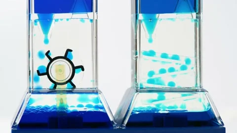 Complex blue fluid hourglass machine, time flow concept, liquid dropping Stock Footage 169759490