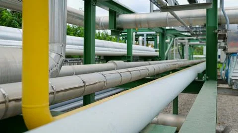 A complex chemical pipeline network is designed and installed with modern e.. Foto stock
